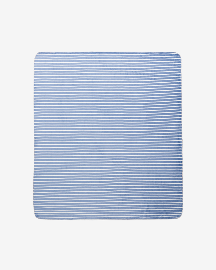 A rectangular blanket with a light blue and white horizontal stripe pattern, shown flat against a light gray background.