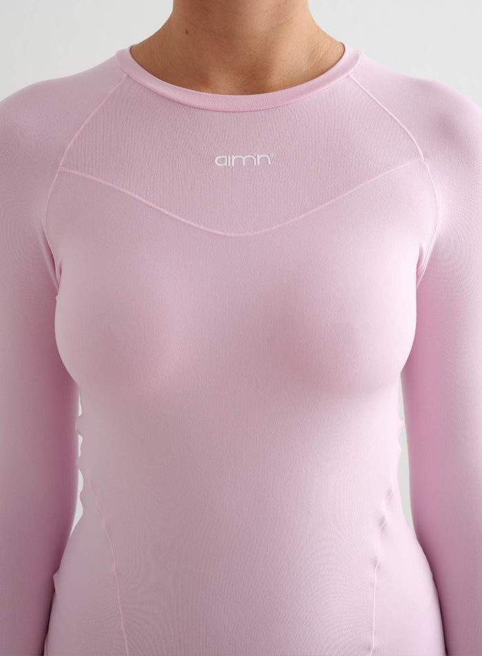 Cotton Candy -vaaleanpunainen aim'n Soft Basic Long Sleeve pyöreällä pääntiellä ja pienellä valkoisella logolla.