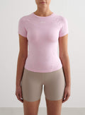 Vaaleanpunainen Soft Basic Short Sleeve -treenipaita merkiltä aim'n pyöreällä pääntiellä ja second skin -tunnulla.