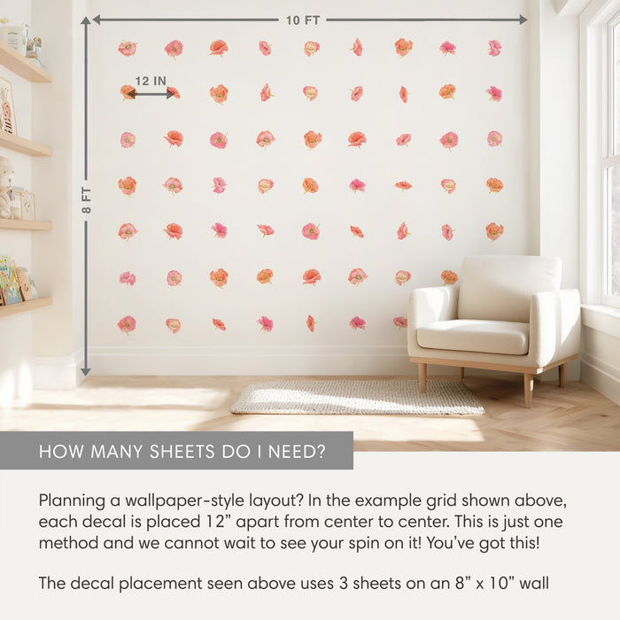 Pink and coral poppy wall decals in a wallpaper-style grid layout (12‑inch spacing) on an 8 x 10 ft cream wall — removable peel-and-stick floral decals above a white armchair and wooden shelves