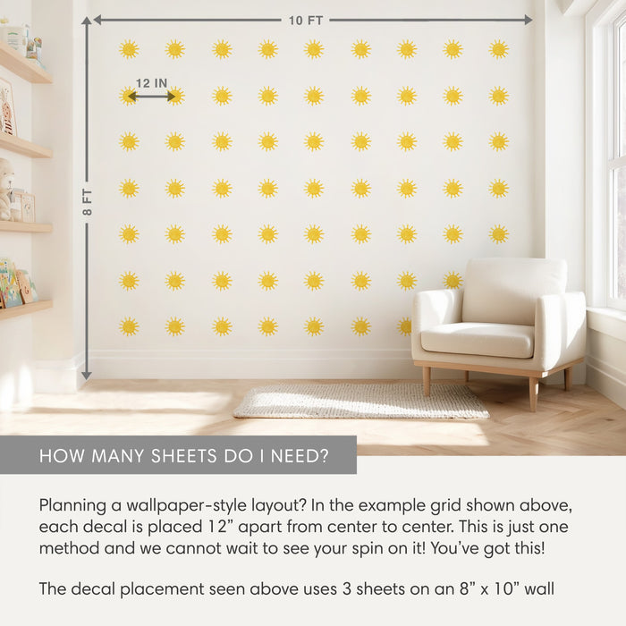 Yellow sun wall decals in a 12-inch grid on an 8x10 ft nursery wall with armchair and shelves — wallpaper-style sun sticker layout and sheet spacing guide