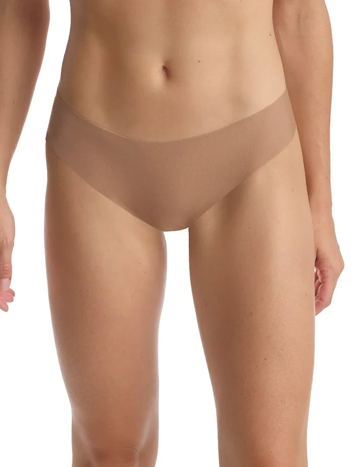 Woman wearing toffee-colored Commando Midrise Thong