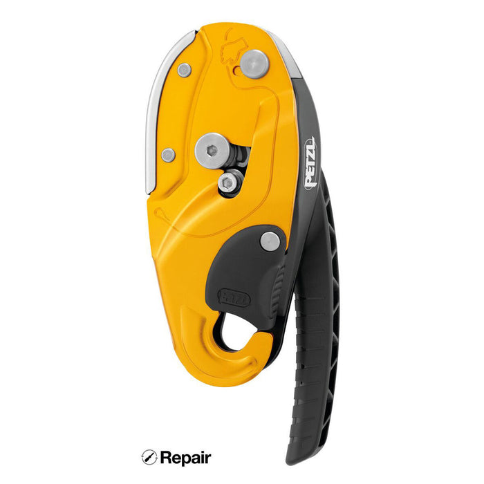 Yellow and black Petzl climbing device on a white background