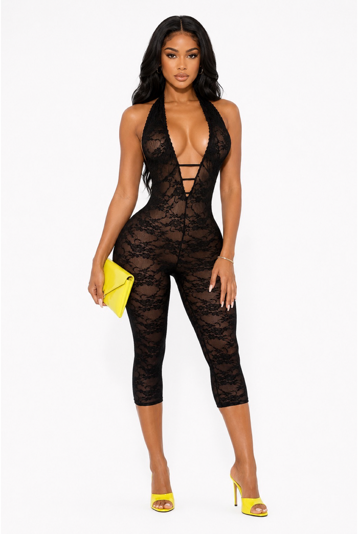 Black halter deep V lace capri romper with bodycon fit styled with neon yellow heels and matching clutch.