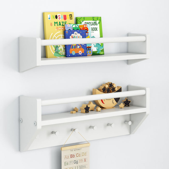 White wall-mounted nursery shelf with colorful children's books (dinosaurs, maze, vehicles) and wooden star toys — modern kids room storage and decor