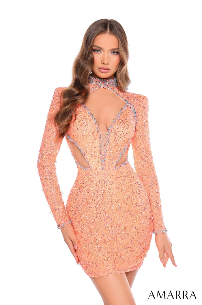 A model wears a form-fitting, long-sleeved Dreamsicle/Light Blue sequined dress with cutout details.