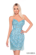 A model wears a strapless, embellished cocktail dress in Light Blue/Electric Blue with shimmering fringe.