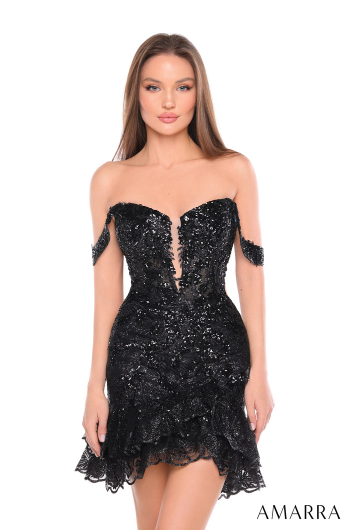 A model wears a strapless, sequined Black cocktail dress with a fitted bodice and ruffled hem by Amarra.