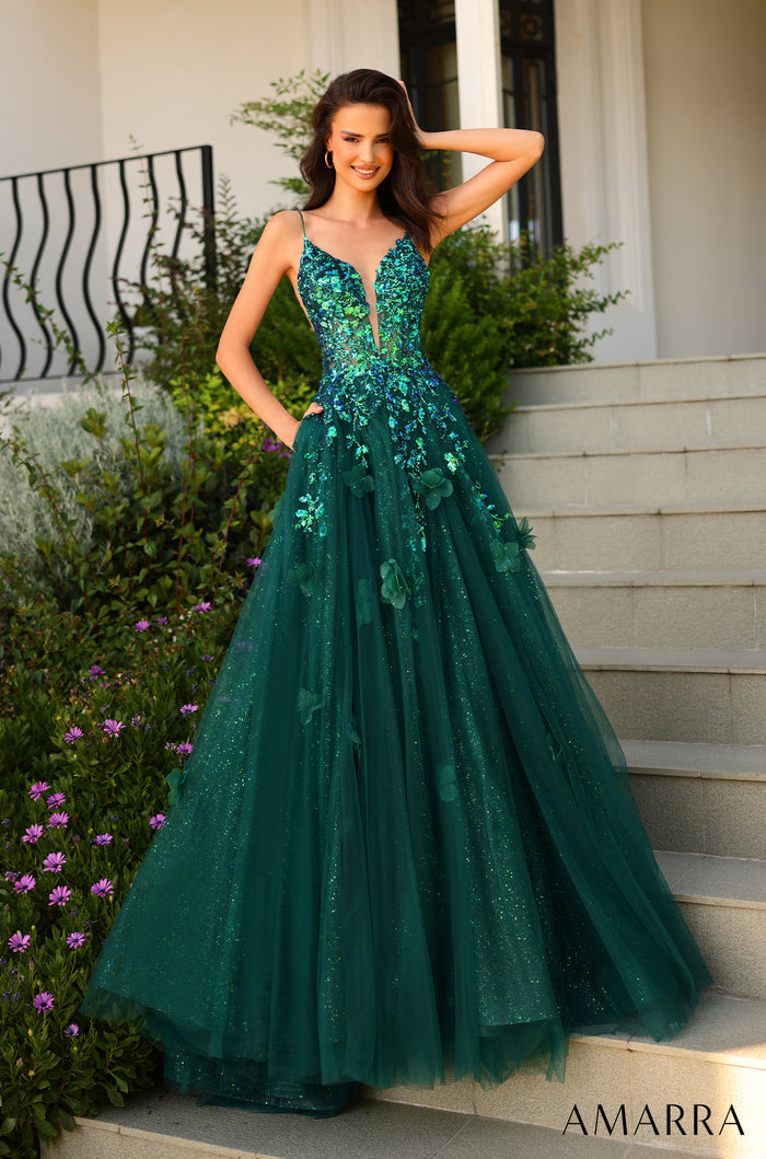 A floor-length emerald green ball gown with sequined bodice and 3D floral details.