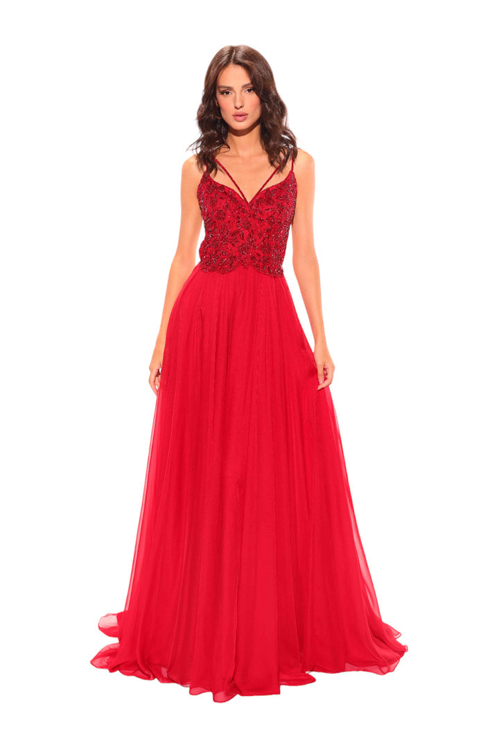 A floor-length red gown with a sequined bodice and delicate spaghetti straps.