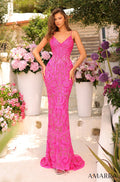 A woman wears a form-fitting, floor-length neon pink sequined gown with spaghetti straps in a garden setting.